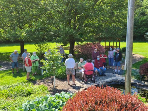 Residents attending remembrance tree dedication